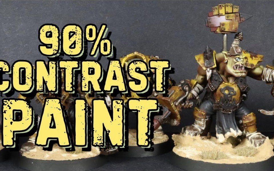 Painted Ork miniatures with yellow armour from the Wrecka Krew box